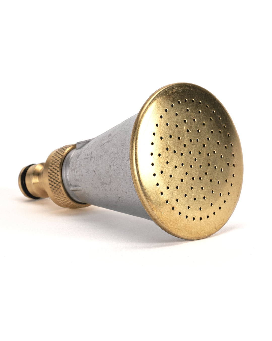 a gold and silver shower head on a white background