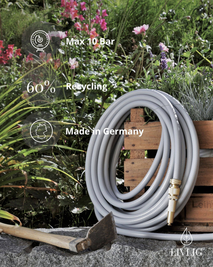 a garden hose is connected to a wooden box