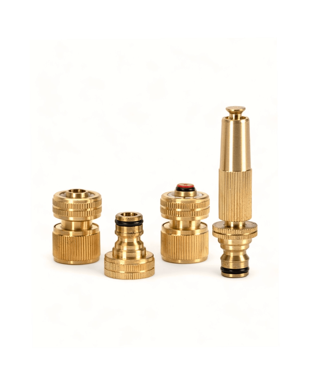 a group of brass fittings on a white background