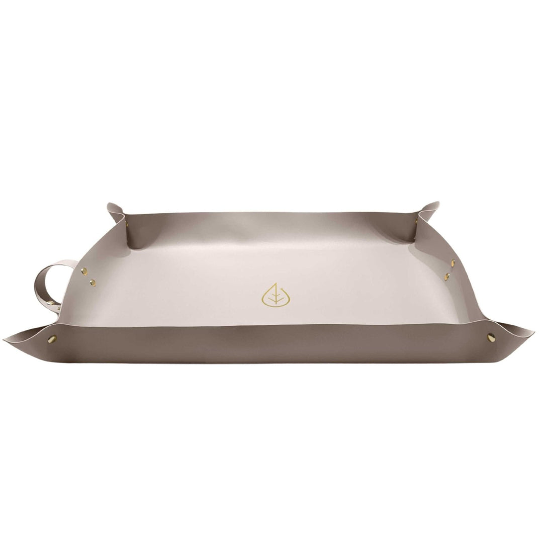 Graue Pflanzmatte 30x60 cm von LIVLIG mit goldenem Logo und goldenen Nieten.