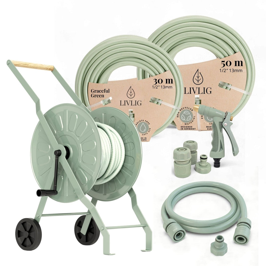 Graceful Green garden hose reel set by LIVLIG with 30m and 50m hoses, spray nozzle, connectors, and black wheels, side view